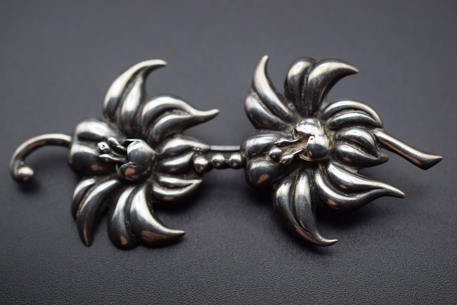 Taxco Sterling Repousse Brooch Pin Vintage Lot BE13: Taxco Sterling Repousse Brooch Pin Vintage measures 3" x 1 3/8" weighs 13.52 grams signed on the back Sterling Taxco some wear to the tip of the bin back just a tiny bit