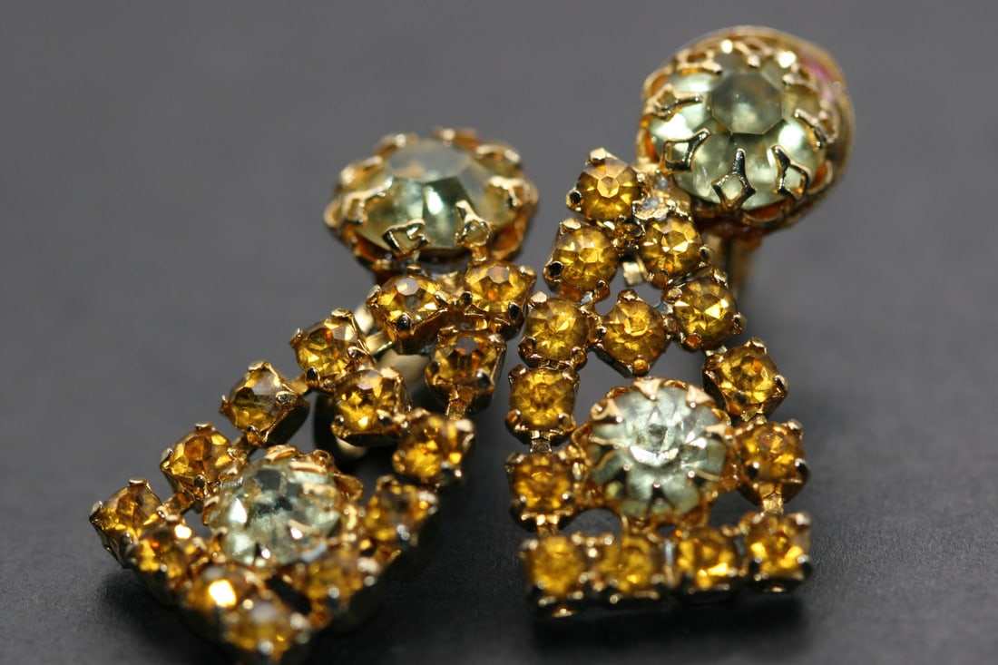 Rhinestone Clip Vintage Earrings Lot 1031: Rhinestone Clip Vintage Earrings measures 1 1/4" x 5/8" clips are different on the backs