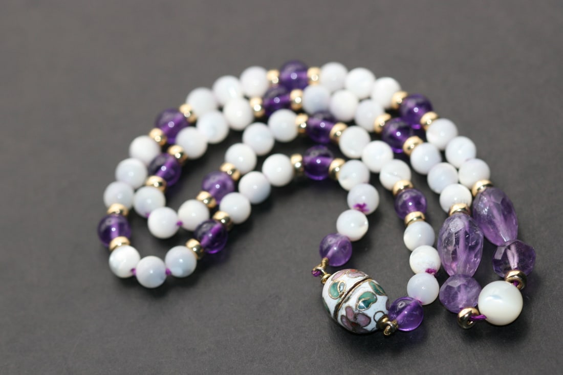 Genuine Amethyst MOP Cloisonne Necklace Lot 1064: Genuine Amethyst MOP Cloisonne Necklace measures 17 1/2" Long beads 13mm to 6mm
