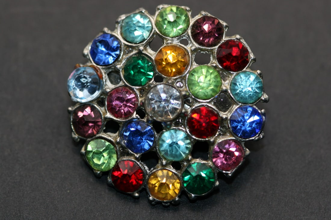 Multi Colored Rhinestone 1940's Lapel Brooch Vintage Lot 1159: Multi Colored Rhinestone 1940's Lapel Brooch Vintage measures 1" in diameter