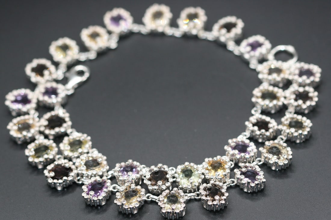 AMAZING Sterling Pastel CZ Necklace 101 Grams ! .Lot#24: AMAZING Sterling Pastel CZ Necklace 101 Grams ! Measures 22" long x 1/2" wide and is signed 925 on the clasp and on the back of every single link ! outstanding !