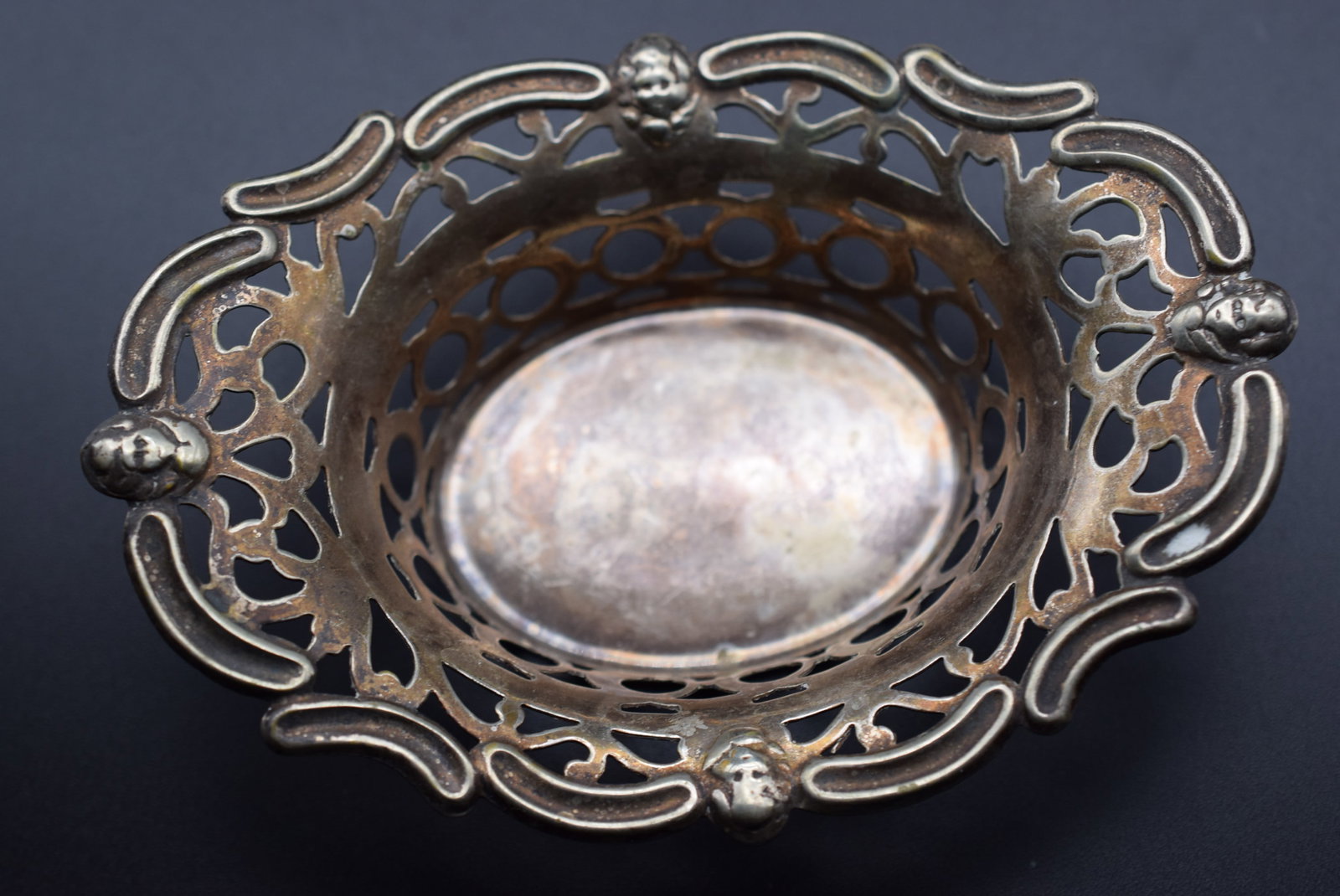 1800's British Cutwork Cherub Dish Lot#CF 165: 1800's British Cutwork Cherub Dish measures 4 1/2" x 3 1/4" and is 1" high see very old hallmarks - very old