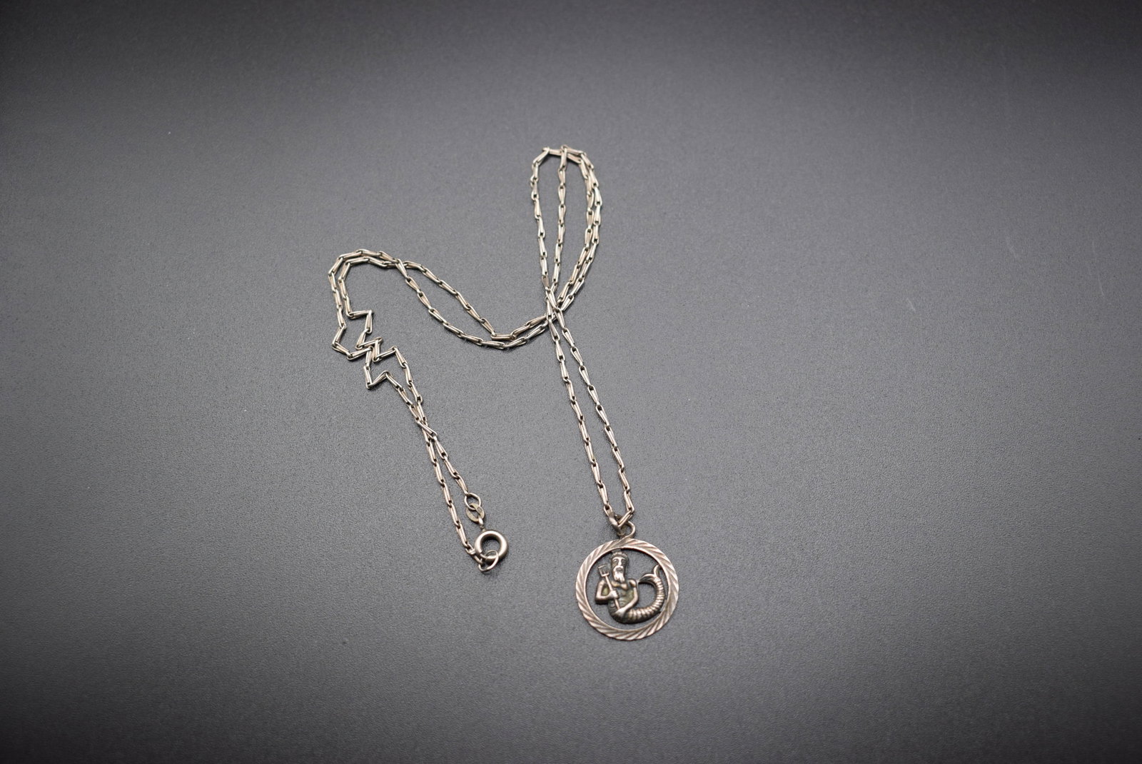 Aquarius Necklace Sterling Silver 925 Poseidon Gd of the Sea .Lot#169: Aquarius Necklace Sterling Silver 925 Poseidon Gd of the Sea pendant measures 3/4" and the sterling chain is 21" long signed on the chain 925 and on the pendant O ring 925, really intricate chain link