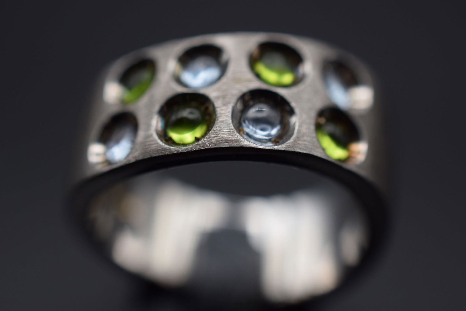 Zoppini Italy Firence Green and Crystal Clear Cabochons Sterling Silver 925 Ring Size 7.25 Lot 254: Zoppini Italy Firence Green and Crystal Clear Cabochons Sterling Silver 925 Ring Size 7.25 Weighs 9.12 grams Top measures 3/8" signed 925 Zoppini Firenze (Florence)