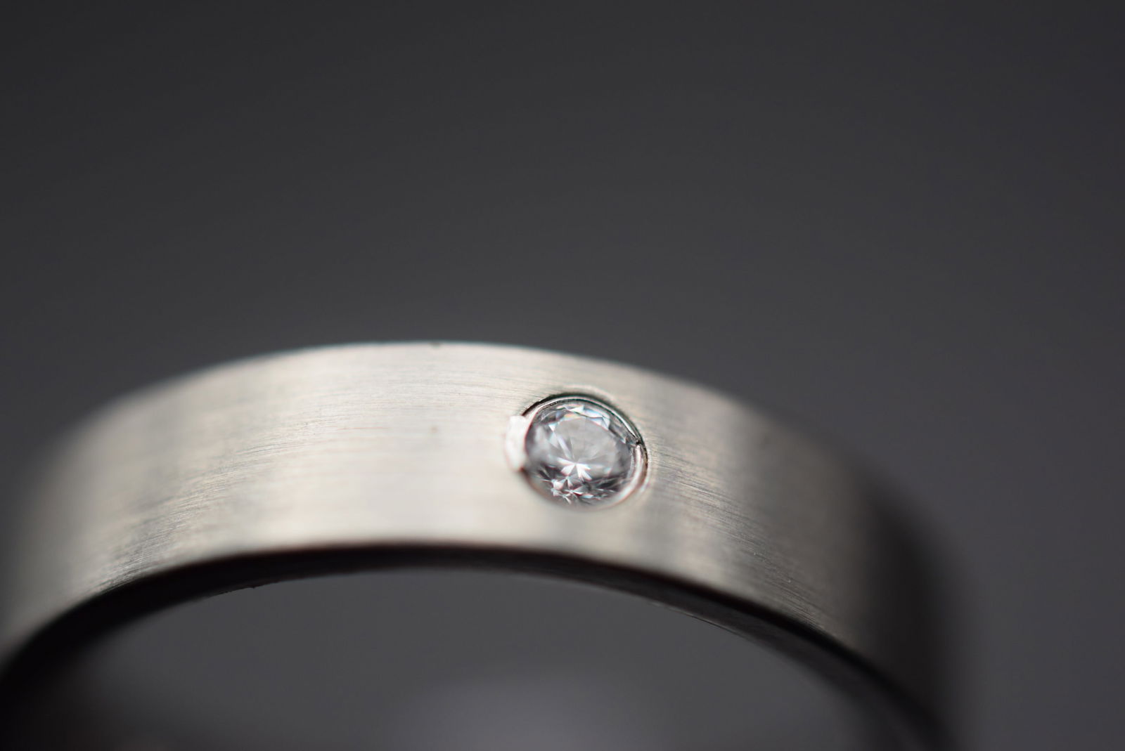 Lumani Stainless Steel Ring Size 6.5 Lot 347: Lumani Stainless Steel Ring Size 6.5 Top measures 1/4" signed Lumani