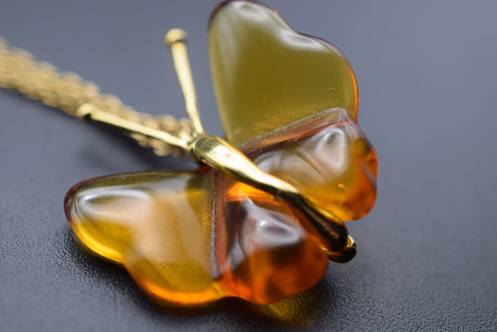 Amber Glass Butterfly Necklace Bravo Avon Vintage Lot# DG 380: Amber Glass Butterfly Necklace Bravo Avon Vintage measures 1 1/8" x 1 1/8" chain measures 18" long