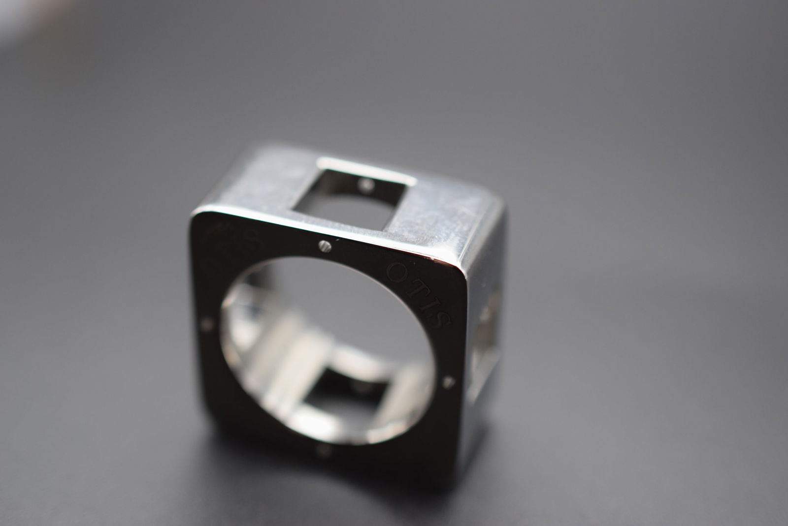 Otis Manuel Zed Stainless Steel Ring Size 7.75 Lot 383: Otis Manuel Zed Stainless Steel Ring Size 7.75 measures 1/2" wide signed S Steel Otis