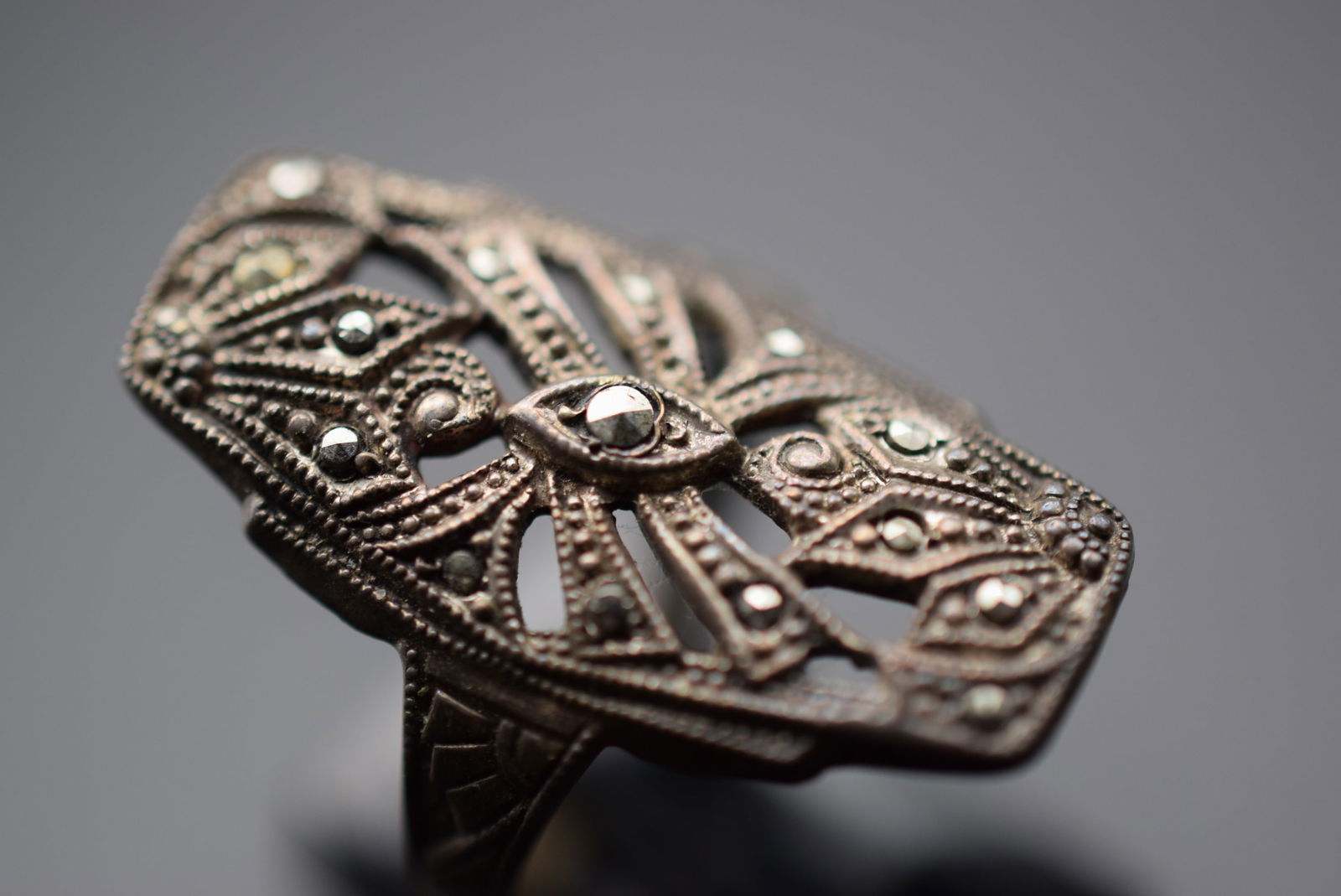 Marcasite Vintage Sterling Silver 925 Ring Size 7.25 Lot 457: Marcasite Vintage Sterling Silver 925 Ring Size 7.25 Weighs 4.07 grams Top measures 1 1/8" signed Sterling