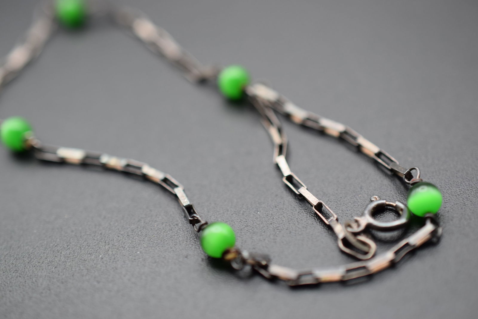 Ankle Bracelet Green Cats Eye Sterling Silver 925 Lot 583: Ankle Bracelet Green Cats Eye Sterling Silver 925 Weighs 2 grams measures 9 1/2" long signed Italy 925 on a disk and on the clasp signed 925