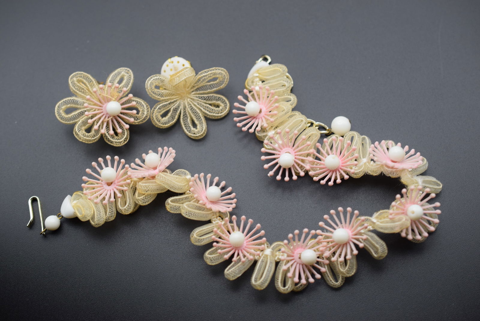 Amazing Vintage plastics Necklace Earrings West Germany 1930's Rare Lot 785: Amazing Vintage plastics Necklace Earrings West Germany 1930's Rare Necklace Signed Western Germany measures 15 1/2" long and so delicate and wonderful handmade the matching clip earrings are signed W