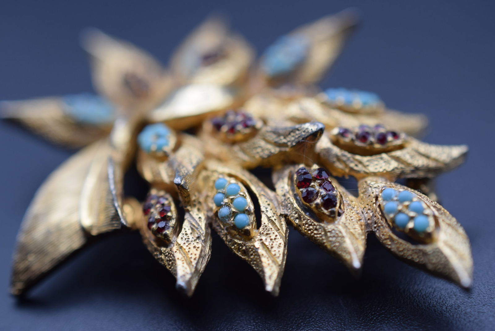 Schaparelli Brooch Pin Signed Turquoise Balls and Red Rhinestones Lot DG 896: Schaparelli Brooch Pin Signed Turquoise Balls and Red Rhinestones measures 2 3/4" x 2" signed on the back Schaparelli and C copyright