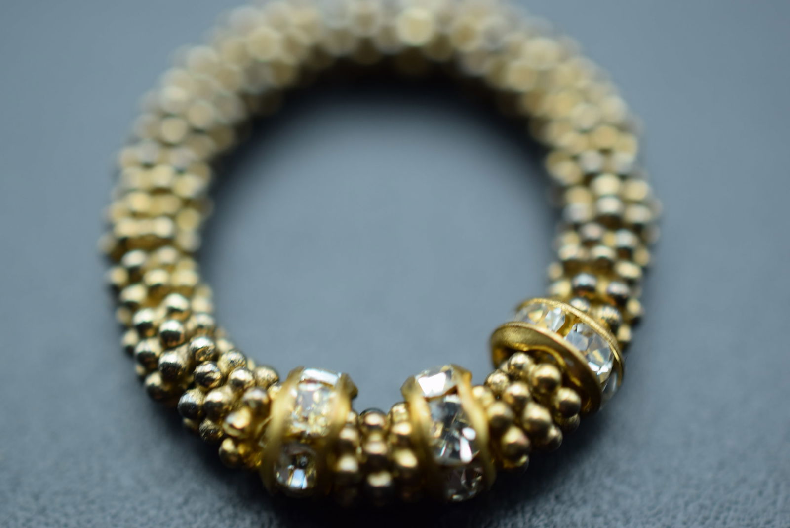 Hammered Dots Rhondelle Rhinestone Stretch Ring One Size Lot# DG 898: Hammered Dots Rhondelle Rhinestone Stretch Ring One Size measrues 3/4" inside unstretched