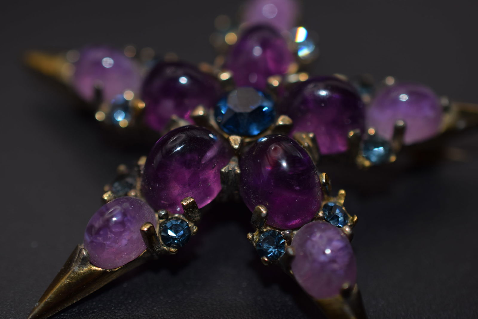 Boucher Purple Star Cabochon Brooch Pin Lot DG 907: Boucher Purple Star Cabochon Brooch Pin measures 2 1/4" in diameter signed Boucher very old not numbered