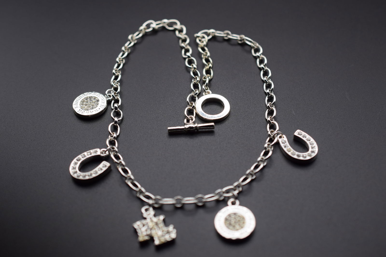 Ralph Lauren Lauren Lucky Charm CZ Necklace Horseshoe Signed Lot 1137: Ralph Lauren Lauren Lucky Charm CZ Necklace Horseshoe measures 16" long Signed RLL on the clasp