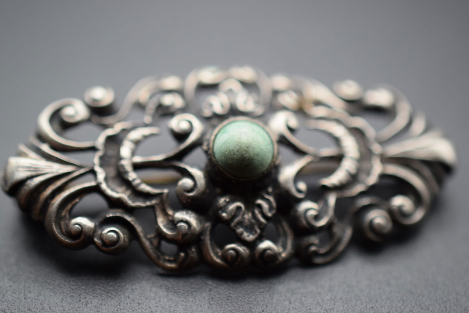 European Silver 835 Designer Signed Vintage 1930's Scroll Turquoise Brooch Pin Vintage Lot 1167: European Silver 835 Designer Signed Vintage 1930's Scroll Turquoise Brooch Pin Vintage weighs 7.26 grams measures 1 7/8" x 7/8" signed Symbol for maker and 835