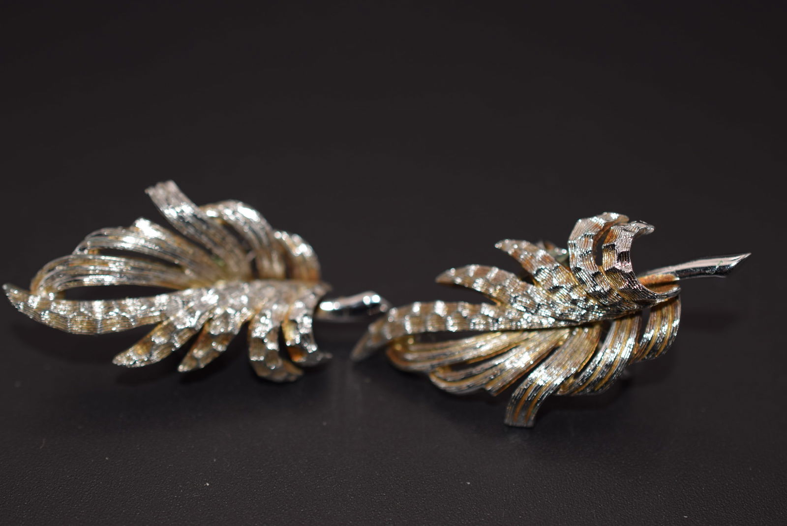 Boucher Signed Vintage Clip Earrings Numbered Lot 1203: Boucher Signed Vintage Clip Earrings Numbered 7161 measures 1 5/8" x 7/8" signed Boucher numbered 7161 on one earring