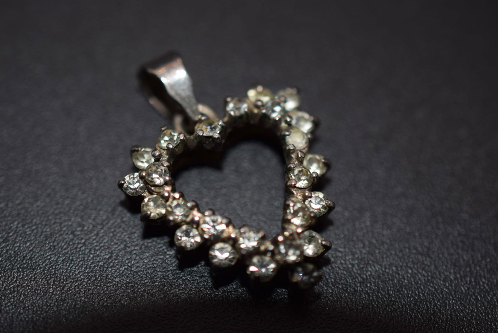 Sterling Silver 925 CZ Heart Pendant Lot 1220: Sterling Silver 925 CZ Heart Pendant weighs 4.05 grams measures 3/4" x 3/4" without the bale signed maker MBS 925