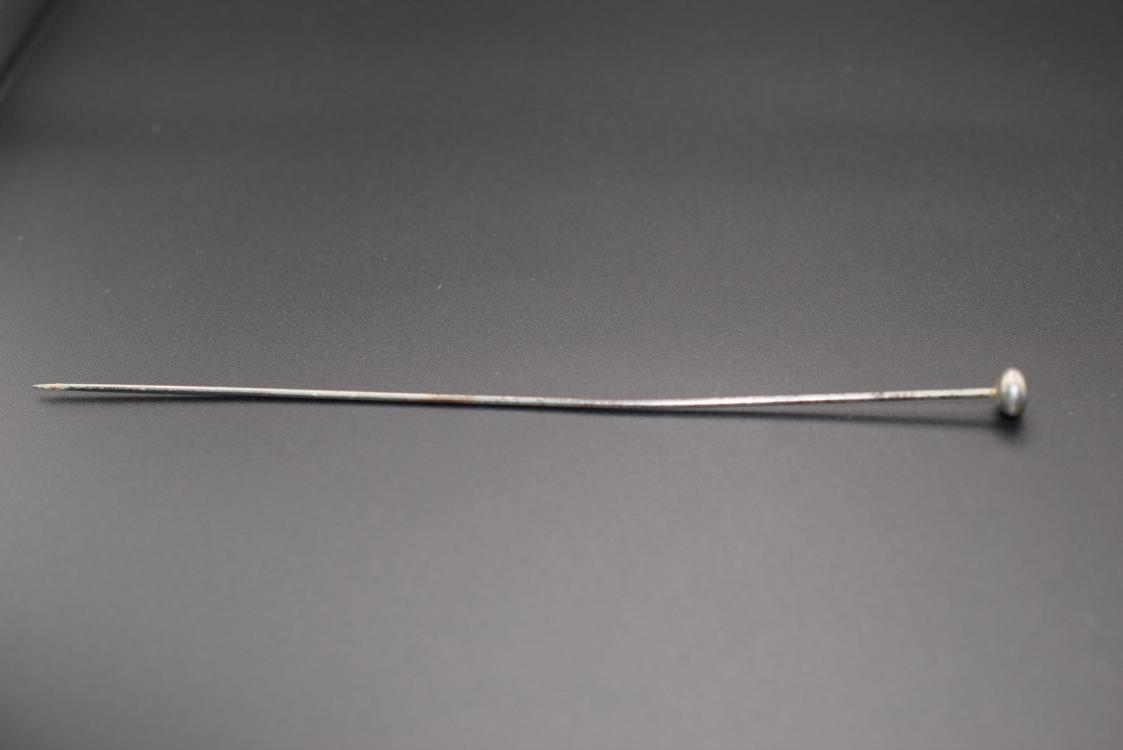 Hat Pin Edwardian Vintage Hatpin measures 6" Lot 1239: Hat Pin Edwardian Vintage Hatpin measures 6" long Round Metal Top head measures 3/8"