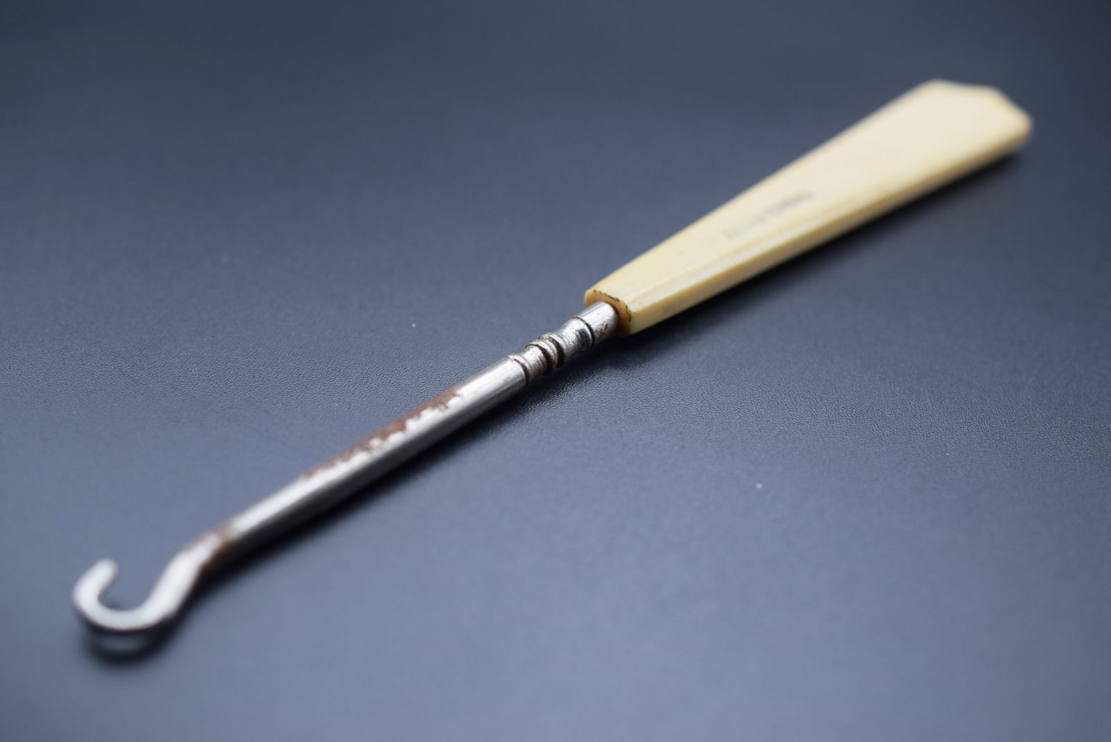 French Boot Hook Vintage Edwardian signed Celluloid Lot# 1248: French Boot Hook Vintage Edwardian signed Celluloid measures 6 1/2" x 3/4"