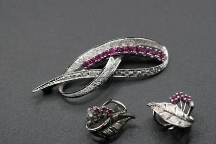 Outstanding Sterling Ruby CZ Brooch Pin Pierced Earrings Set .lot#75: Outstanding Sterling Ruby CZ Brooch Pin Pierced Earrings Set brooch measures 2 1/4" x 3/4" and the pierced earrings measure 3/4" x 3/4" signed 925 on all three pieces.lot#75