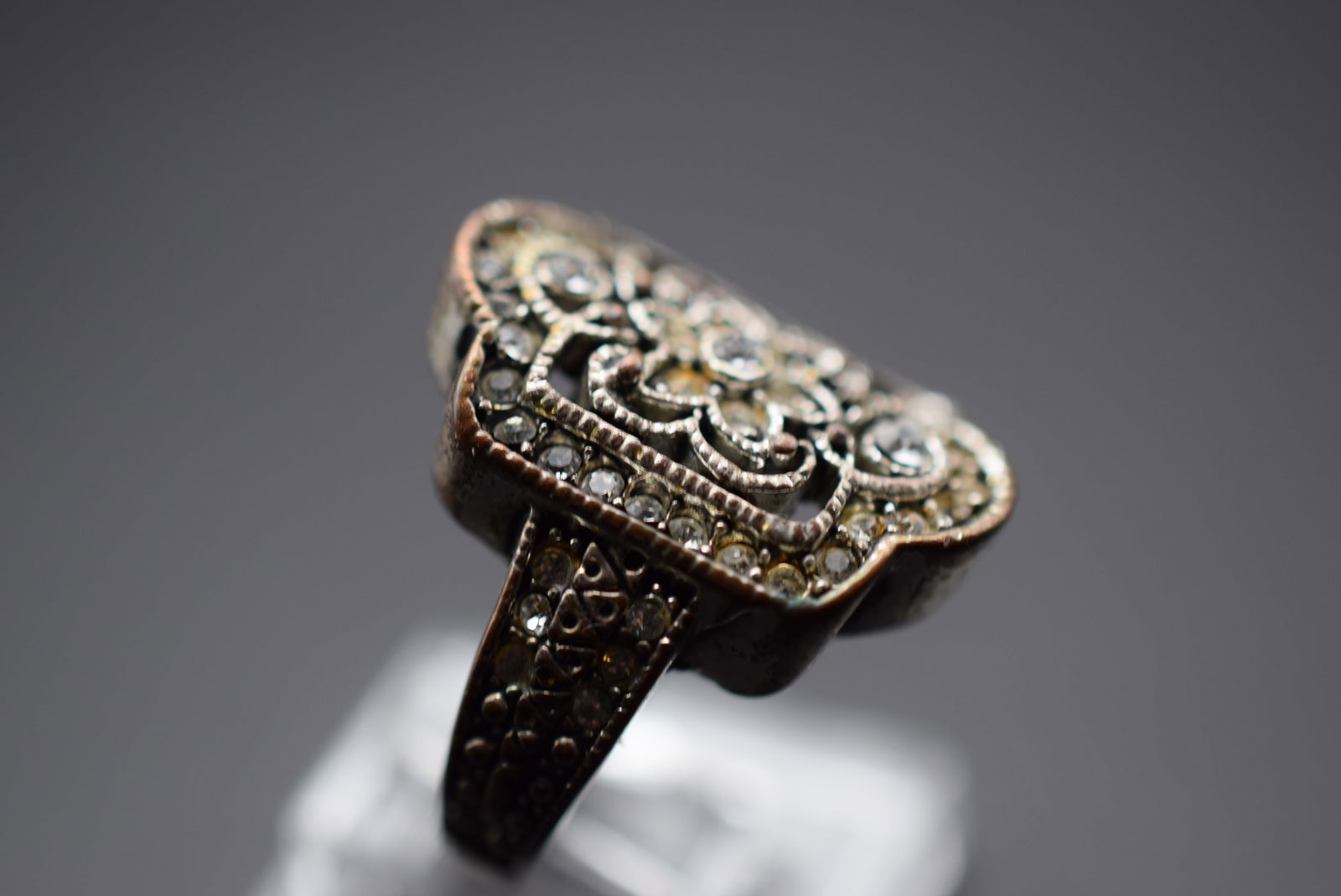 CZ Diamante Ring Size 5.5 Lot EH 184: CZ Diamante Ring Size 5.5 top measures 7/8" plated brass wear to the plating on the shank