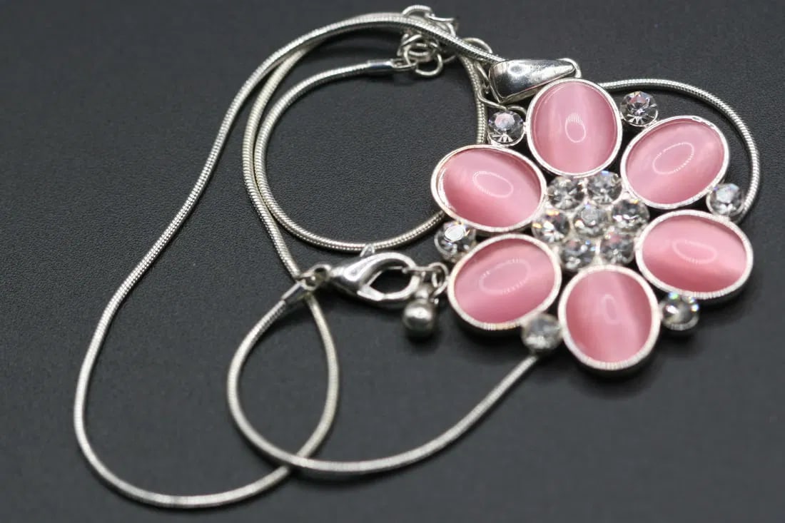 Pink Rose Cat eye Cabochon Flower Necklace Pendant .lot#240: Pink Rose Cat eye Cabochon Flower Necklace Pendant flower measures 1 1/2" in diameter and the chain measures 18" long but can be worn as short as 16" by using the connector links
