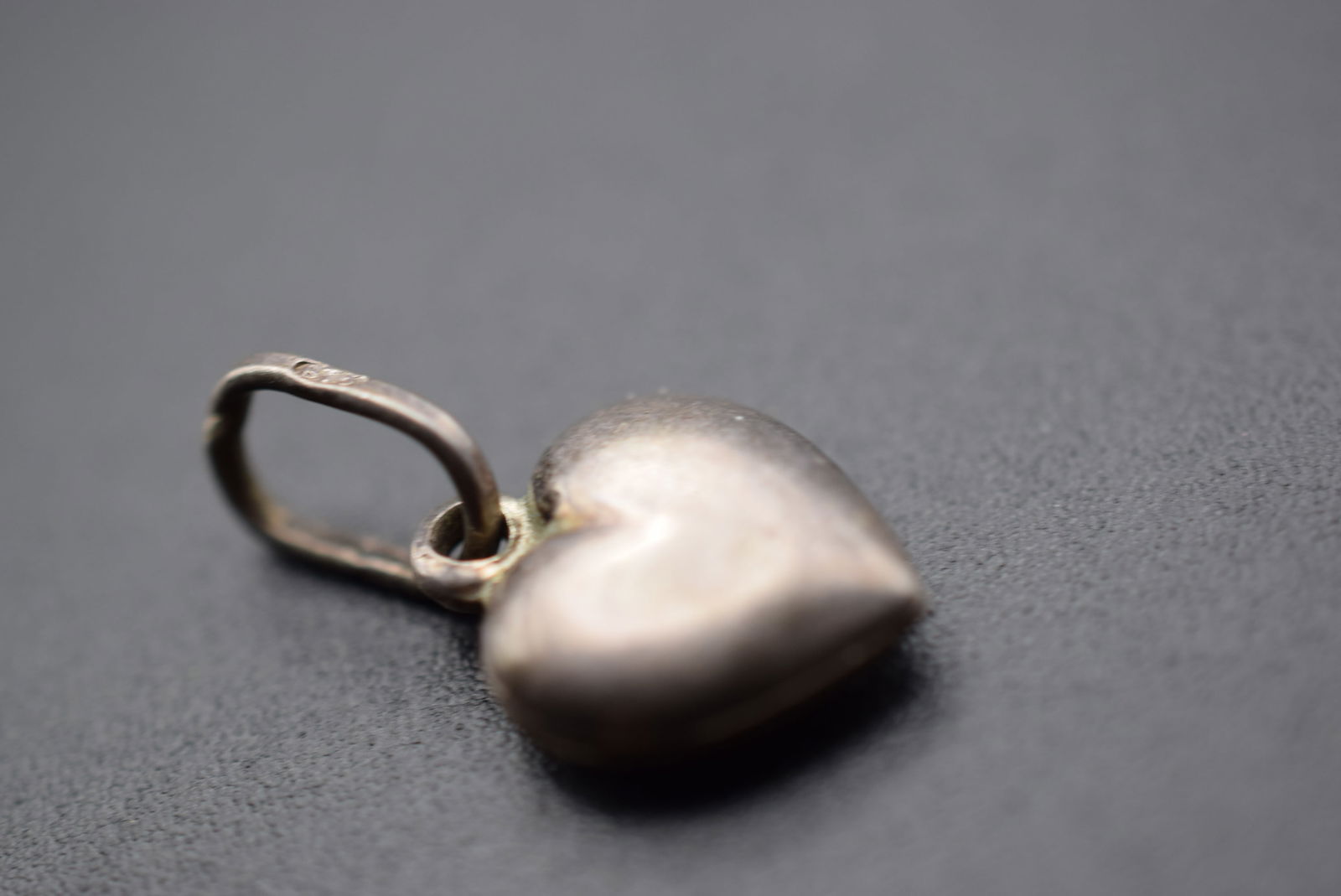 Teeny Tiny Puffy Heart Sterling Silver 925 Pendant Lot EH 256: Teeny Tiny Puffy Heart Sterling Silver 925 Pendant measures 1/2" x 3/8" plus bale signed 925 on the bale weighs 1.36 grams