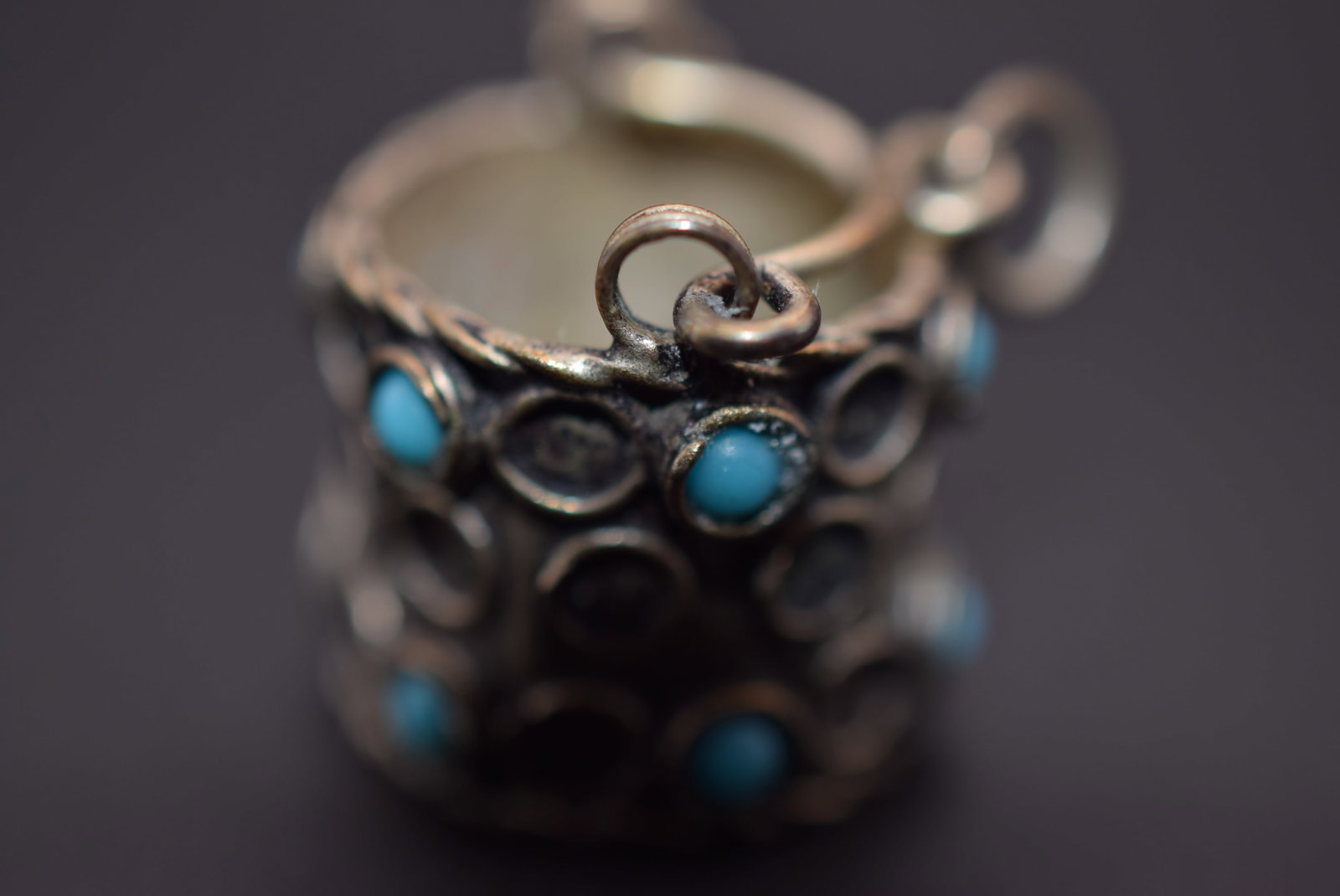 Bucket Charm Turquoise Pendant Lot EH 313: Bucket Charm Turquoise Pendant unsigned measures 7/8" x 3/4" weighs 4.11 grams