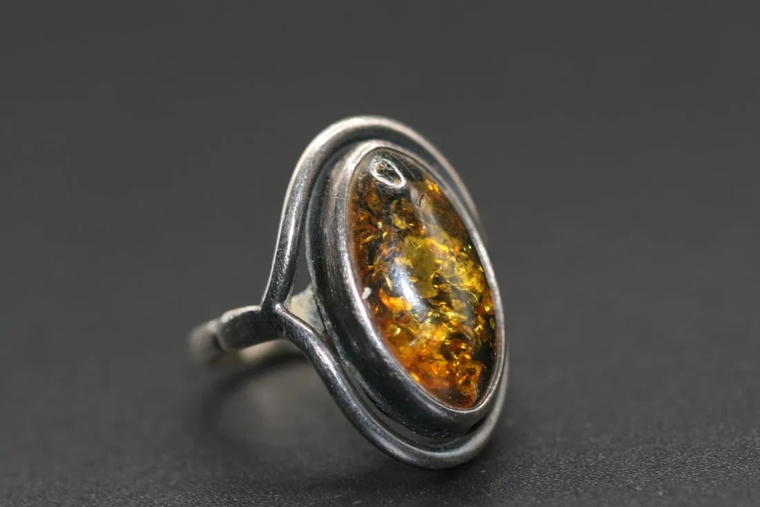 Amber ring size 5.5 Sterling Silver 925 .Lot#367: Amber ring size 5.5 Sterling Silver 925 top measures 1" long handmade unmarked silver