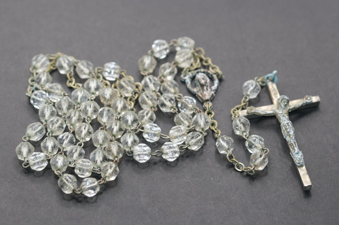 Rescued Rosary Italy needs TLC Crystal Vintage Lot 682: Rescued Rosary Italy needs TLC Crystal Vintage measures circumference 27" drop 6 3/4" hanging length 20" stamped Italy on the Crucifix and the crucifix and medal have verdigris beads are heavily praye