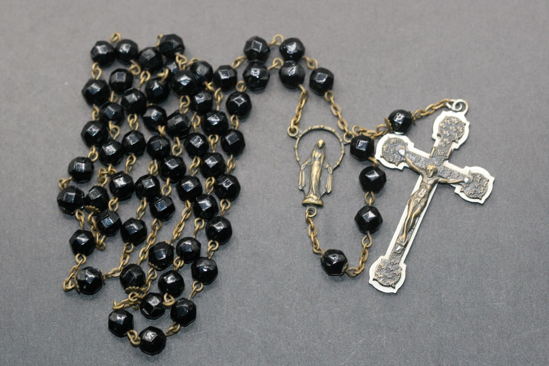 Rosary Black Crystal Vintage Lot 724: Rosary Black Crystal Vintage measures circumference 26" drop 6 1/2" hanging length 19 1/2" stamped Ste.Anne Beaupre on the Crucifix nice quality