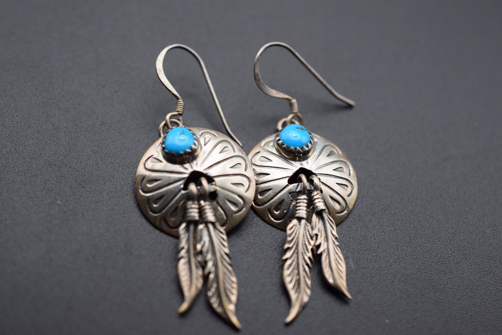 Navajo Sterling Feather Pierced Turquoise Earrings Lot EH 810: Navajo Sterling Feather Pierced Turquoise Earrings measures 1 1/2" x 7/8" plus the bale signed 925 on the bale weighs 5.57 grams