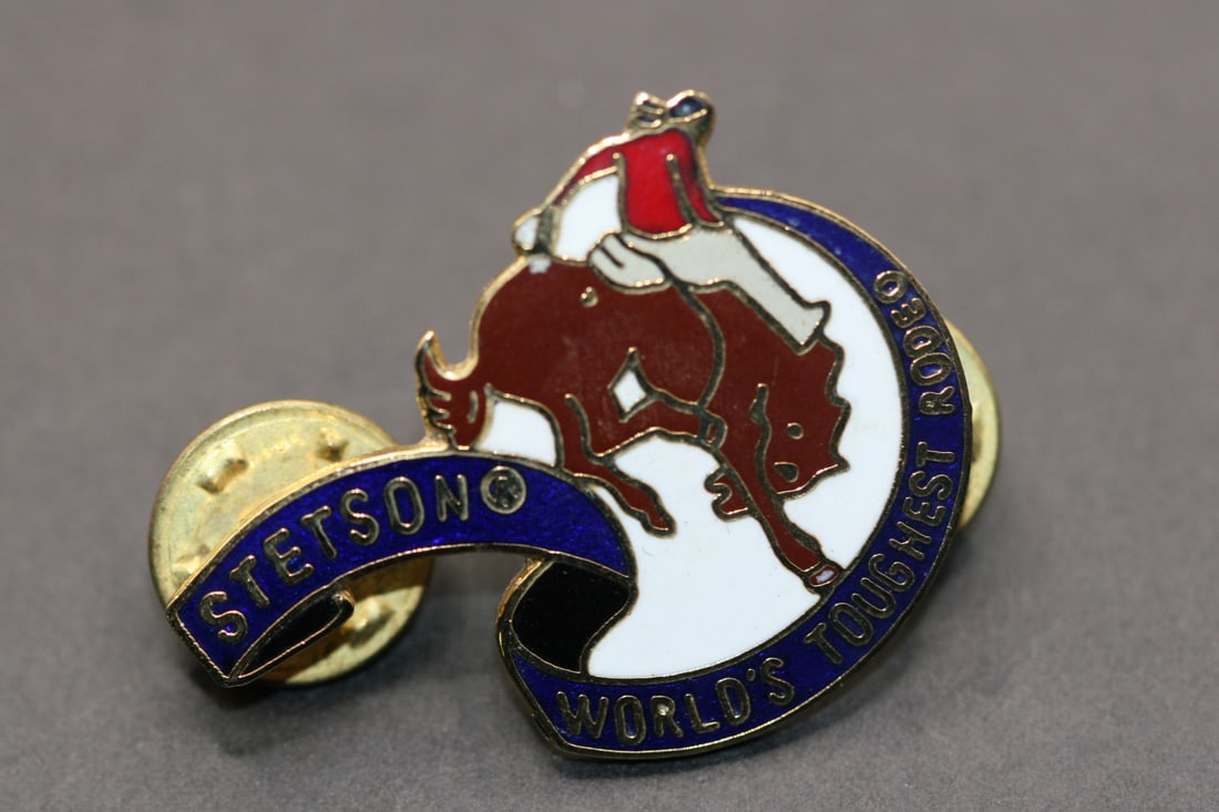 Stetson Worlds Toughest Rodeo Enamel Lapel Pin Vintage Lot 857: Stetson Worlds Toughest Rodeo Enamel Lapel Pin Vintage measures 1 1/2" x 1"