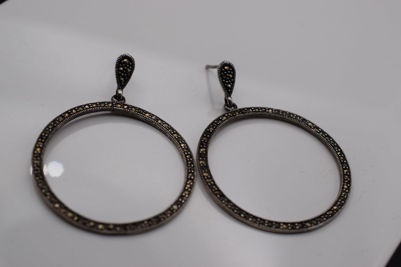 Marcasite Hoop Earrings Pierced Sterling Silver 925 Lot EH 980: Marcasite Hoop Earrings Pierced Sterling Silver 925 measures 1 1/2" in diameter signed 925 weighs 7 grams no earring backings