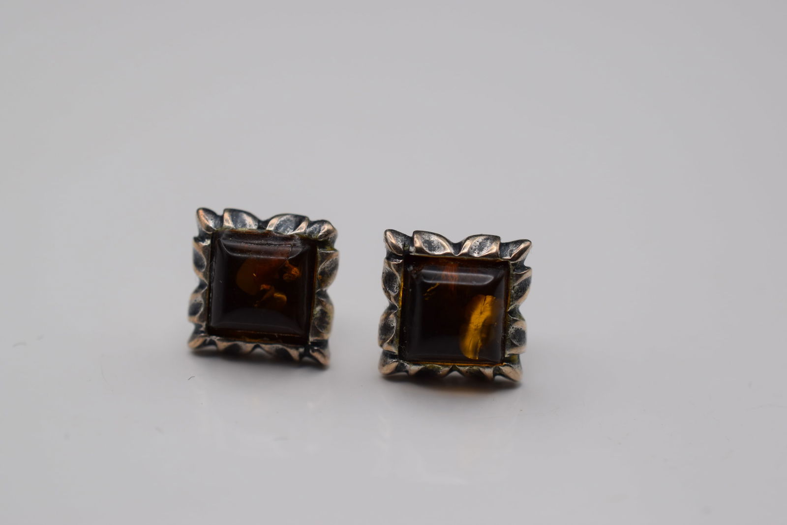 Genuine Amber Pierced Sterling Silver 925 Stuf Earrings Lot EH 1040: Genuine Amber Pierced Sterling Silver 925 Stuf Earrings measures 3/8" x 3/8" unsigned no backings weighs 1.75 grams