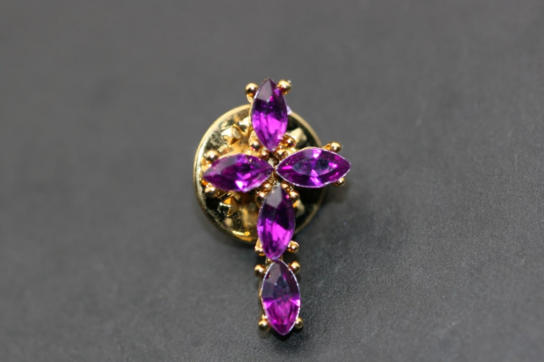 Birthstone Rhinestone Cross Pin Brooch February Amethyst Lot 1050: Birthstone Rhinestone Cross Pin Brooch measures 7/8" x 1/2" February Amethyst