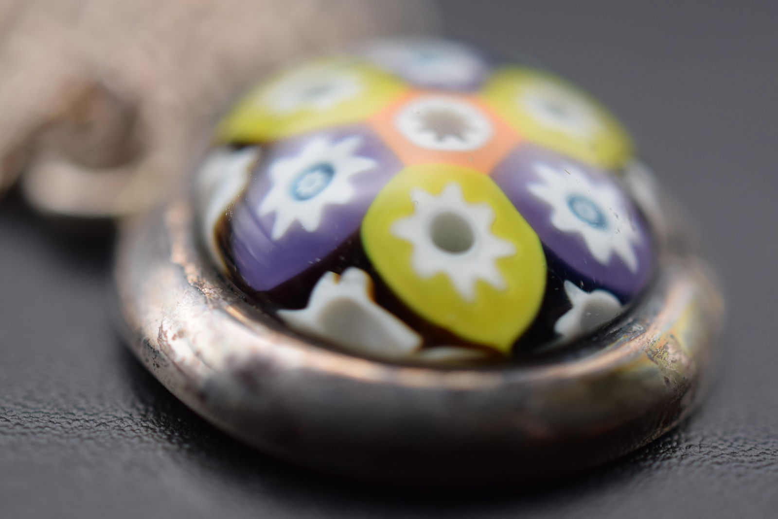 MilleFiore British Hallmarks Sterling Pendant Necklace Vintage Lot EH 1066: MilleFiore British Hallmarks Sterling Pendant Necklace Vintage Pendant has thistle castle and Letter hallmarks and makers mark pendant measures 7/8" in diameter chain is unmarked and measures 22" long