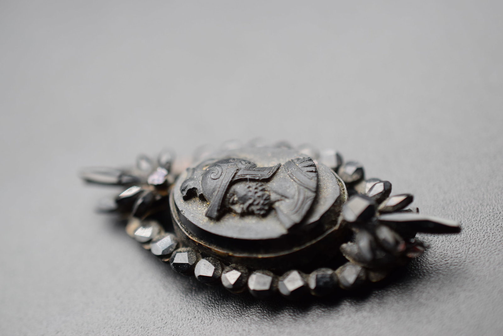 Magnificent Cameo Black Jet Victorian Pendant Vintage Old Lot EH 1097: Magnificent Cameo Black Jet Victorian Pendant Vintage Old measures 2" x 7/8" ring missing to hang the pendant and has a crack in one long stone