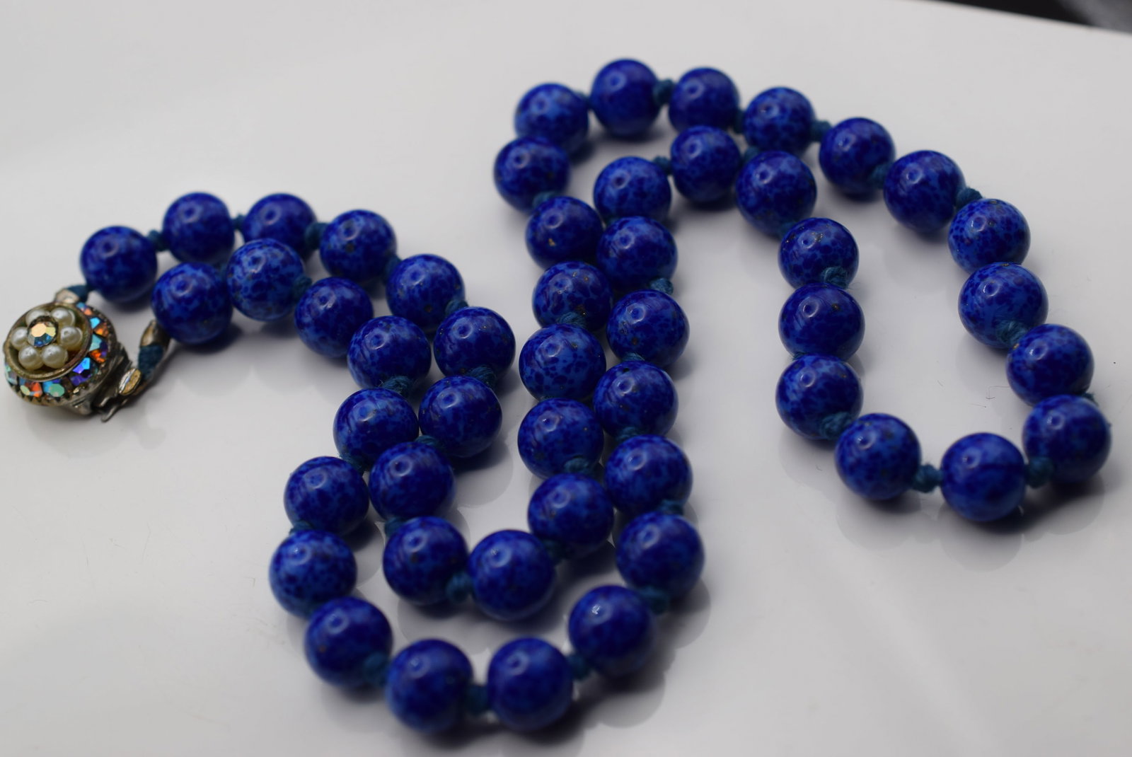 Knotted Old Vintage Blue Art Glass Cobalt Necklace Lot Fi 127: Knotted Old Vintage Blue Art Glass Cobalt Necklace measures 19 1/4" long Rhinestone Clasp Glass Beads Measure mm