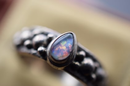 Opal Repousse Dots Sterling Silver 925 Ring Vintage Size 8 Lot 773: Opal Repousse Dots Sterling Silver 925 Ring Vintage Size 8 unmarked untested Silver weighs 7.43 grams measures 1/4" wide band many photos so you can see the color changes at each angle of the light
