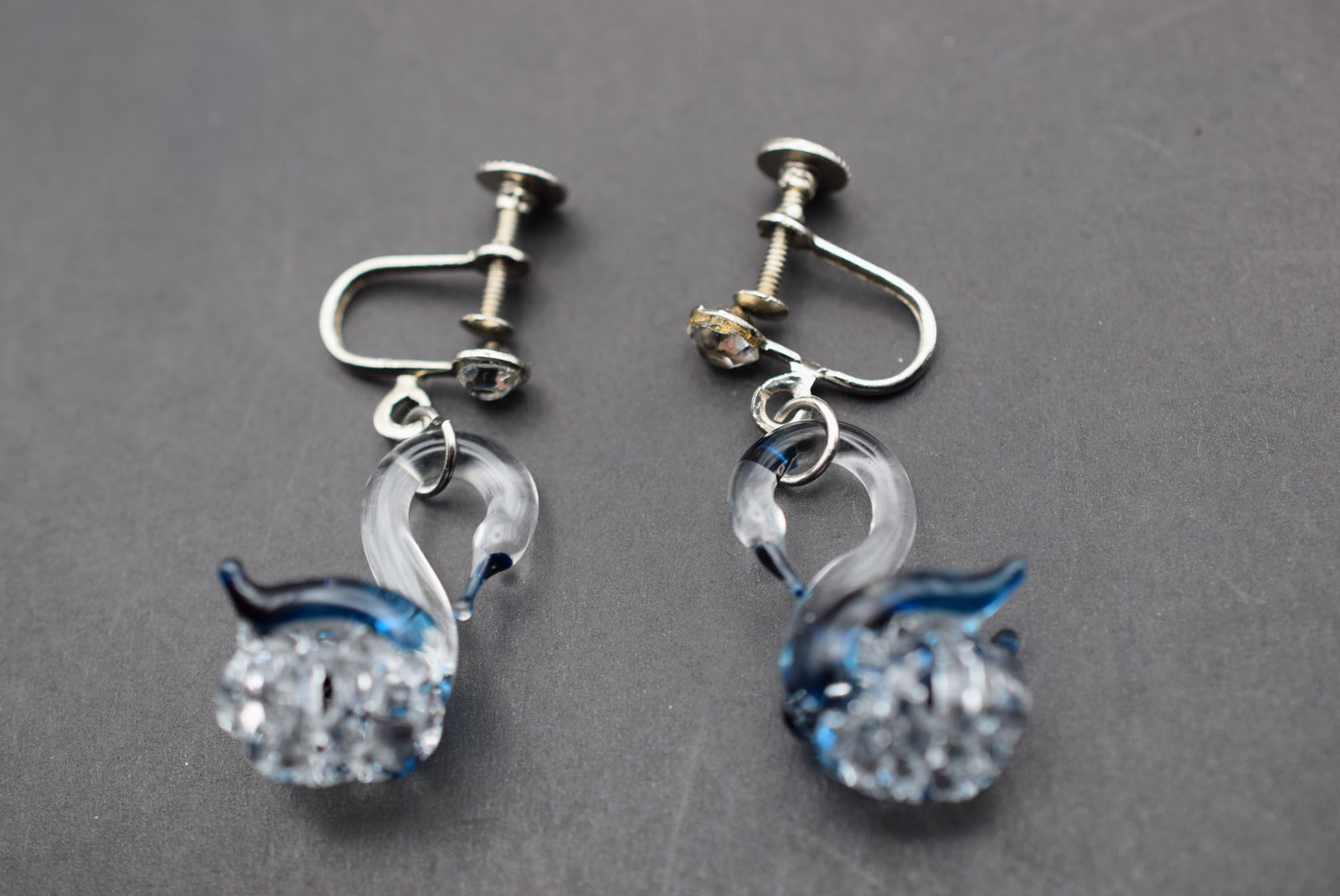 Blown Glass Swan Screw back earrings Lot 859: Blown Glass Swan Screw back earrings measures 1 3/8" x 3/4"