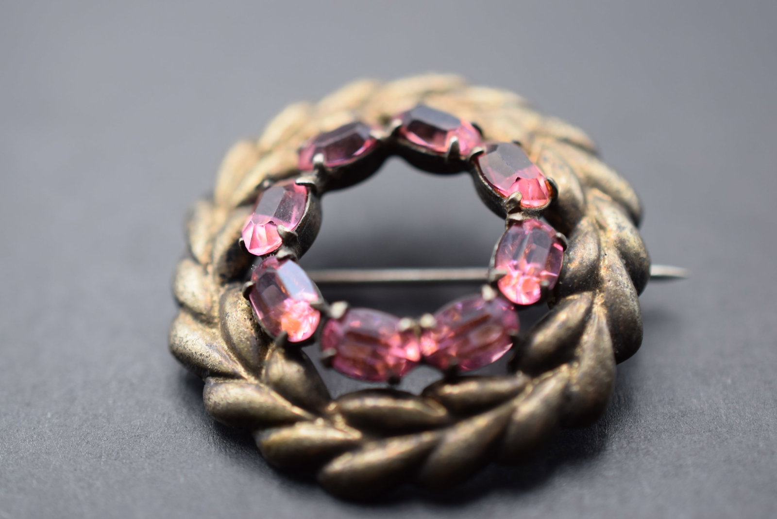 Castelcliff Sterling Silver 925 1940's Rhinestone Pink Brooch Pin Lot 940: Castelcliff Sterling Silver 925 1940's Rhinestone Pink Brooch Pin measures 1 1/4" in diameter weighs 10.50 grams signed on the bacl Castlecliff Sterling