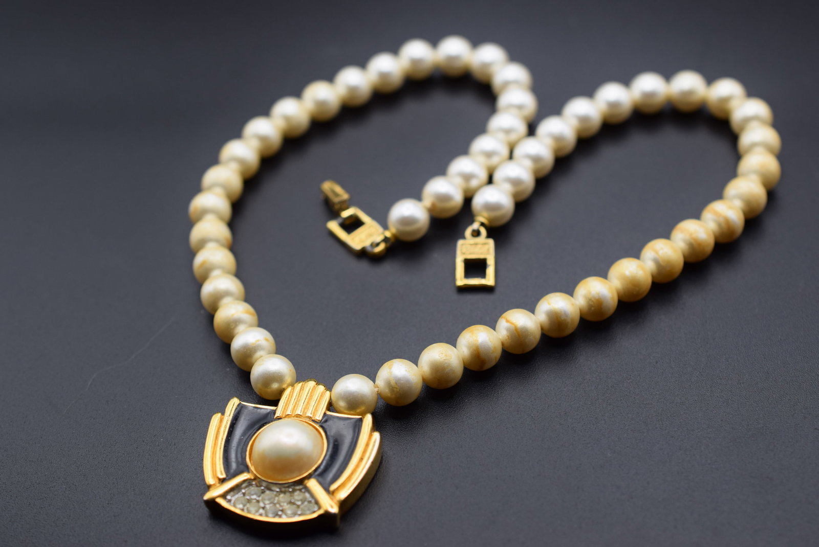 Necklace Signed Rachel Vintage Lot GJ 212: Necklace Signed Rachel Vintage measures 16" long plus the pendant 1 1/4" x 1 1/4" some pearls have changed color from use of perfume over time