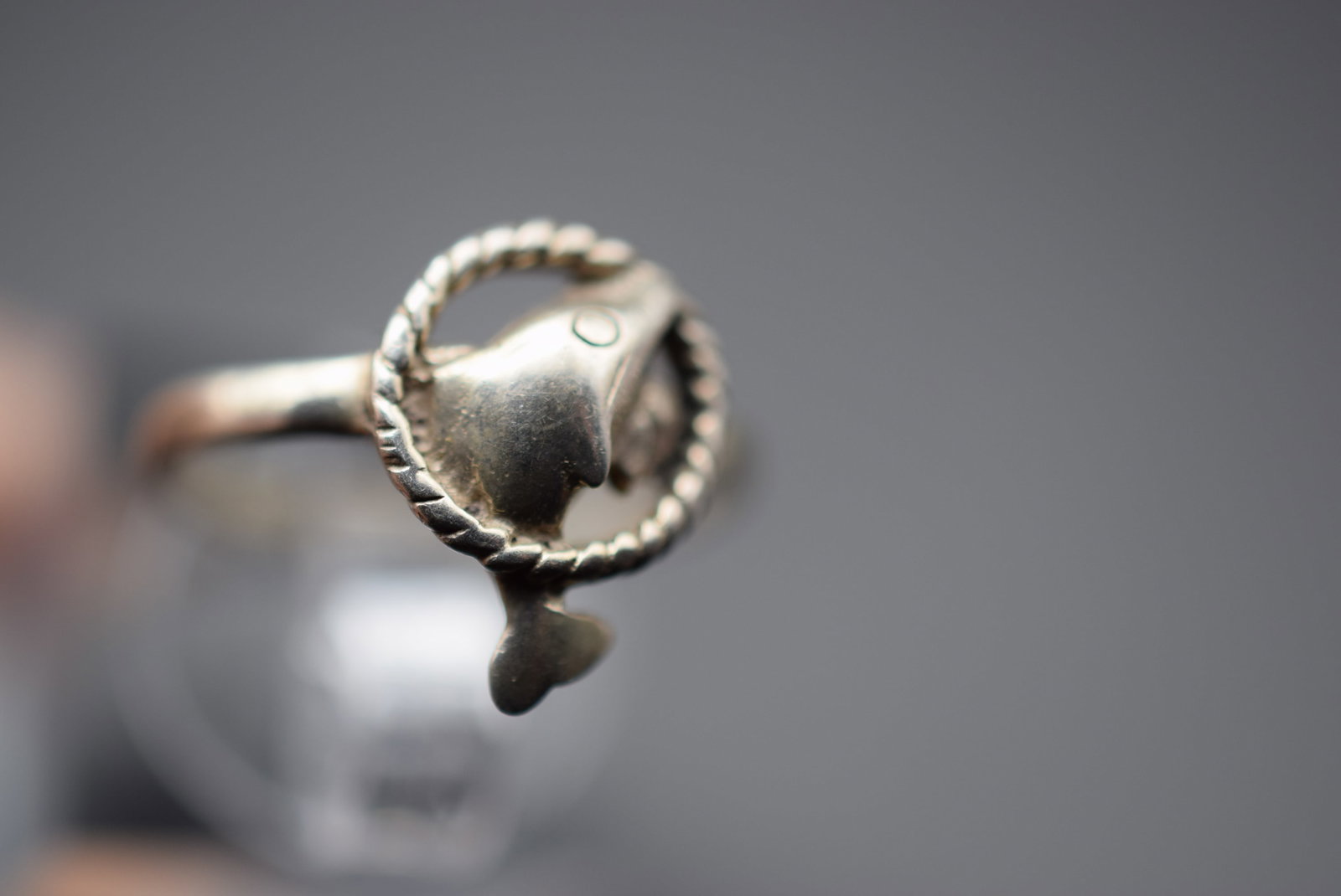 Dolphin Thru Hoop Sterling Silver 925 Ring Size 6.75 Lot 520: Dolphin Thru Hoop Sterling Silver 925 Ring Size 6.75 Weighs 1.79 grams Top measures 1/2" signed 925