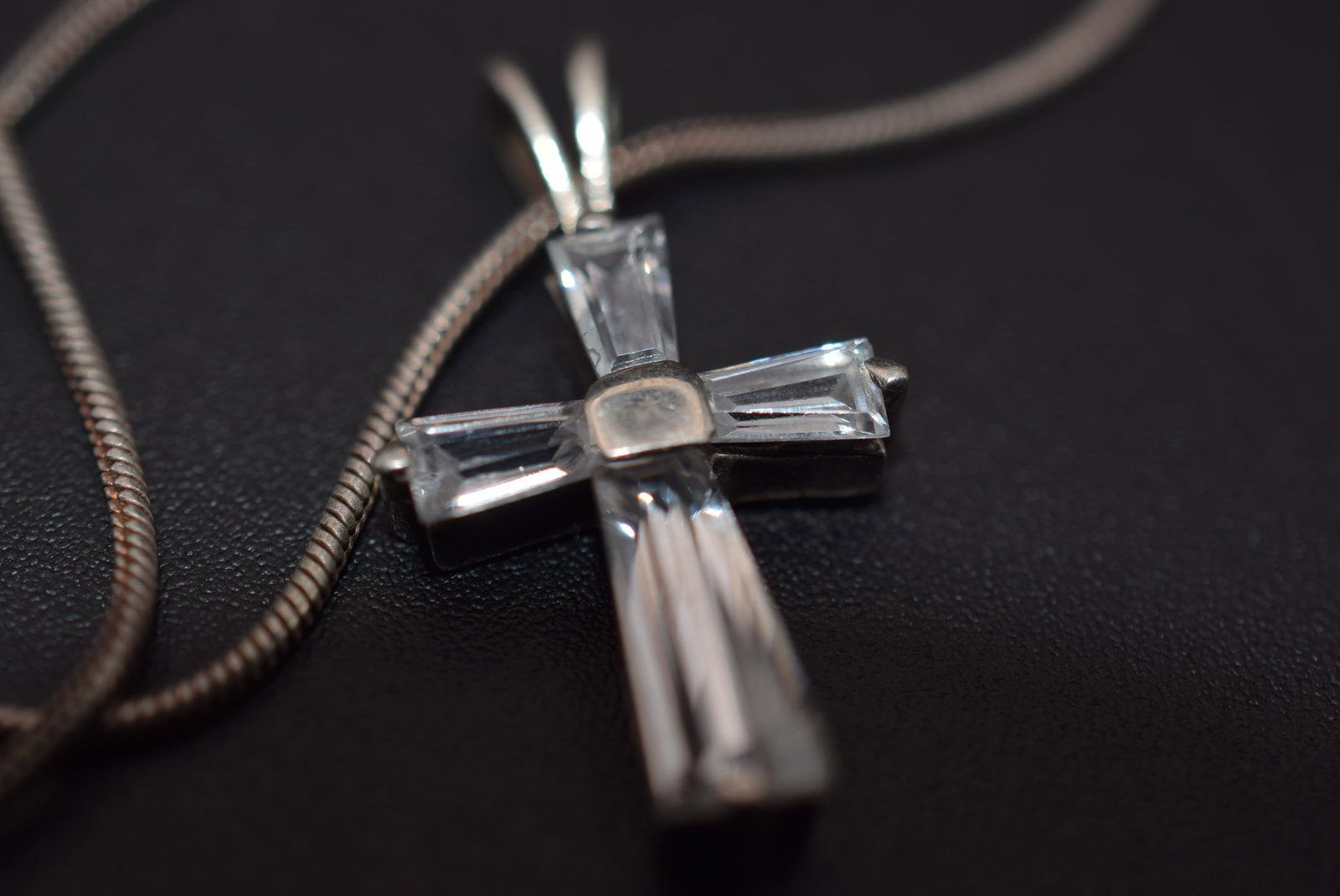 CZ Cross Necklace Pendant Sterling Silver 925 Lot 643: CZ Cross Necklace Pendant Sterling Silver 925 Weighs 5.23 grams Chain measures 15" pendant Cross measures 1" x 1/2" signed C^A 925 on cross and 925 L&P on the chain