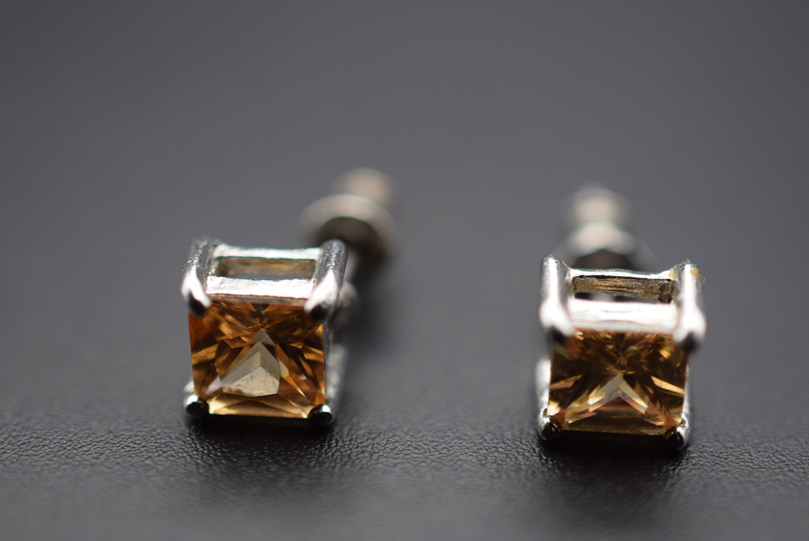 Champagne Square Stud Pierced Earrings Lot 668: Champagne Square Stud Pierced Earrings measures 3/8" x 3/8" 6mm