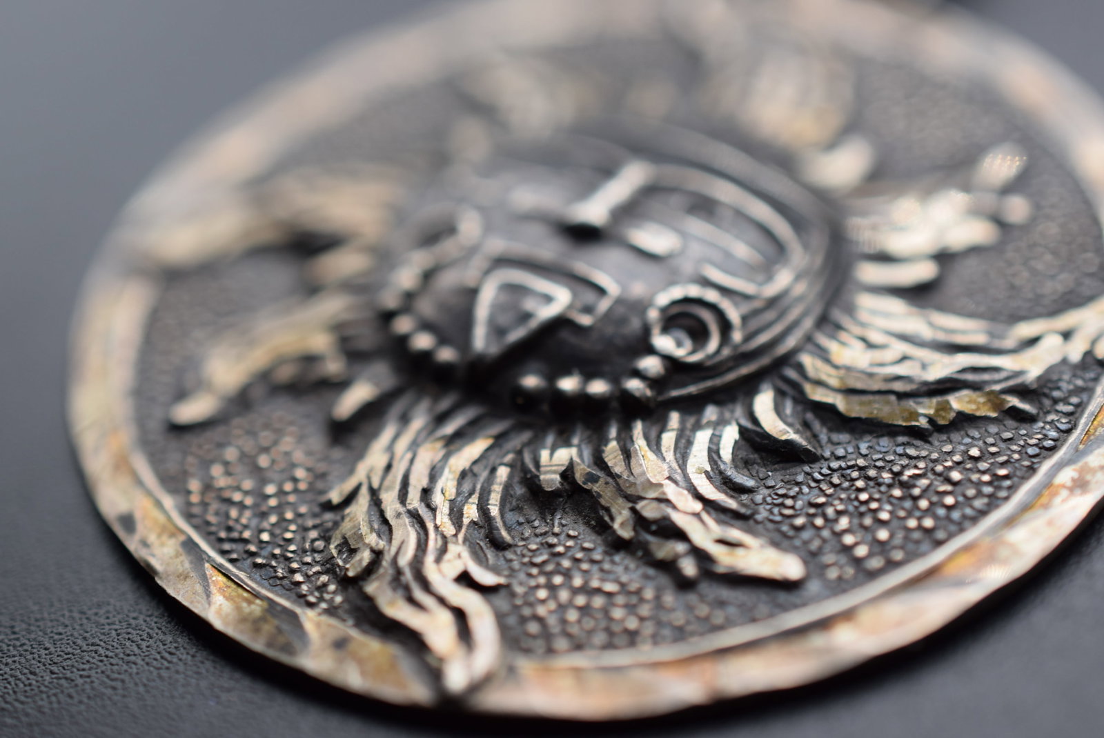 Repousse Mayan Sun Pendant Signed Pictorial Story on both sides Lot# DG 872: Repousse Mayan Sun Pendant Signed Pictorial Story on both sides measures 1 7/8" in diameter and is signed on the bale Mexico Sterling 925 and mexico on the back of the pictorial weighs 11.93 grams