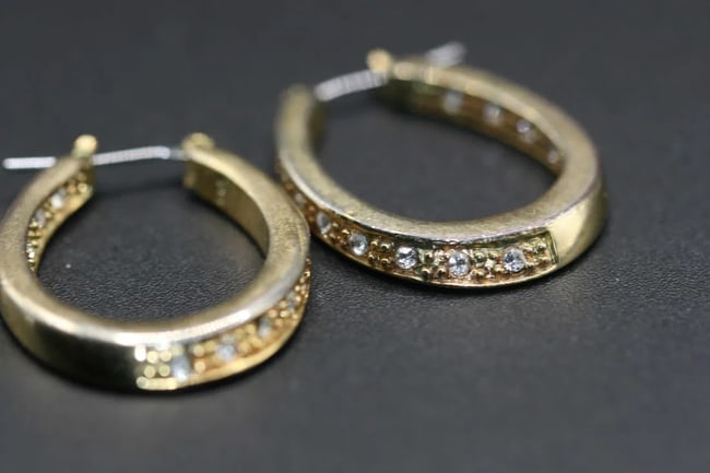 Pierced Rhinestone Earrings .lot#322: Pierced Rhinestone Earrings measures 1 1/8" x 7/8" the stones can be seen on the front and then on the inside going to the back so when you wear them you see stones front and back. signed SO on both e