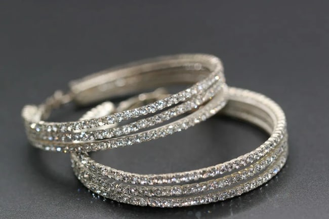 Gigantic Rhinestone Pierced Earrings Hoops 2 1/2" diameter .lot#326: Gigantic Rhinestone Pierced Earrings Hoops 2 1/2" diameter earrings are well made and have a spring action to the backing closure very well made stunning