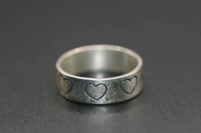 WCM Sterling Silver 925 Ring size 8.25 hearts band .Lot#366: WCM Sterling Silver 925 Ring size 8.25 hearts band WMCo.Wheeler Manufacturing of Lemmon, SD is the mark, used between 1936 -1962. (also WMCo., WMCo. STERLING) weighs 3.86 grams